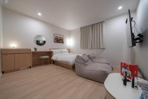 Aank Hotel Ilsan客房内的一张或多张床位