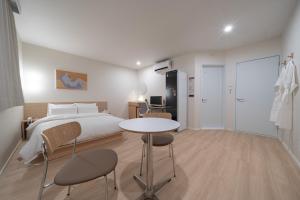 Aank Hotel Ilsan客房内的一张或多张床位