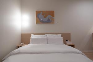 Aank Hotel Ilsan客房内的一张或多张床位