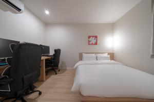 Aank Hotel Ilsan客房内的一张或多张床位