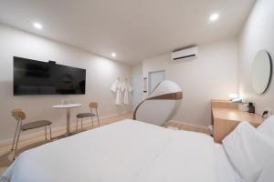 Aank Hotel Ilsan客房内的一张或多张床位