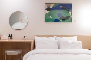 Aank Hotel Ilsan客房内的一张或多张床位