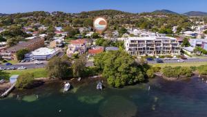 an aerial view of a small island in a body of water at DOUGLAS COTTAGE FORSTER in Forster