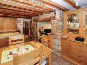 Η κουζίνα ή μικρή κουζίνα στο Fell Cottage +34 φωτογραφίες