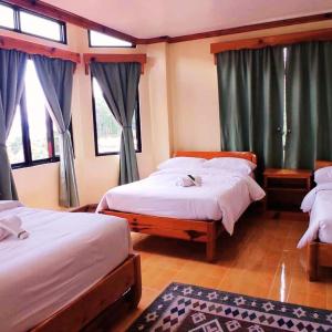 Postel nebo postele na pokoji v ubytování The Lalouette Inn