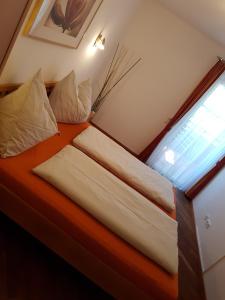 A bed or beds in a room at Appartment Ahorn