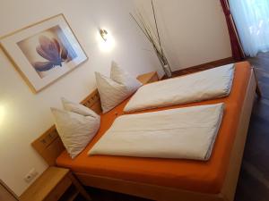 A bed or beds in a room at Appartment Ahorn