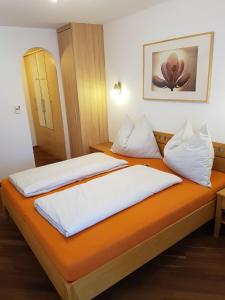A bed or beds in a room at Appartment Ahorn