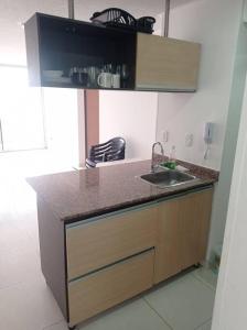 a kitchen with a sink and a counter top at Alex & Kamilo in Bucaramanga
