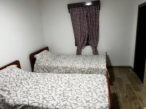 Postel nebo postele na pokoji v ubytování Krcma U Planini