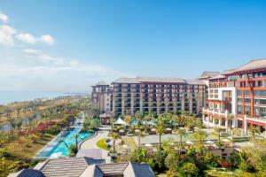 an aerial view of a resort with a pool at Xiamen Marriott Hotel & Conference Centre in Xiamen