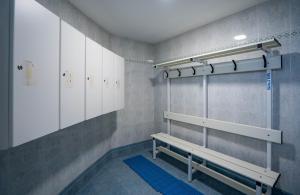 Palanda nebo palandy na pokoji v ubytování Hotel Bartos