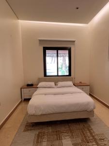 Letto o letti in una camera di Al Artaa Resort