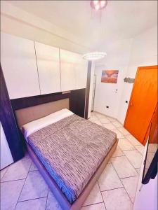 En eller flere senge i et værelse på casa vacanze VIVA House Sicily