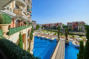 a view of a swimming pool from a building at Florance Rentals Luxury Apartments in Saint Vlas in Sveti Vlas