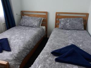Postel nebo postele na pokoji v ubytování La Capsule