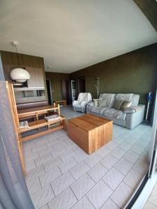 Predel za sedenje v nastanitvi Appartement classé 3 étoiles avec superbe vue
