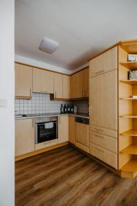 Кухня или мини-кухня в Ferienwohnung Illy
