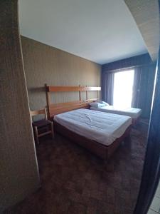 Postel nebo postele na pokoji v ubytování Appartement classé 3 étoiles avec superbe vue