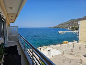 a balcony with a view of the ocean at AGORA luxury APARTMENT 8 in Loutraki