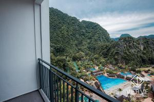 a balcony with a view of a resort at Ipoh Tambun Lost World Onsen by Verve in Tambun