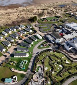 an aerial view of a park with buildings and the ocean at Presthaven Resort Haven Luxury 2023 Caravan in Prestatyn