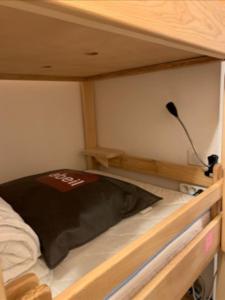 Un ou plusieurs lits dans un hébergement de l'établissement Studio la Foux