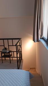 Cama o camas de una habitación en Pagani Green - Luxury Maisonette I2