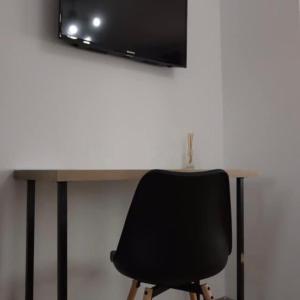TV a/nebo společenská místnost v ubytování Zen