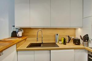 Η κουζίνα ή μικρή κουζίνα στο Ever Sea - apt T3 la Saline les Bains