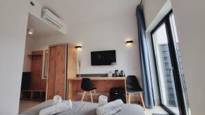 TV a/nebo společenská místnost v ubytování Hotel Konopielka