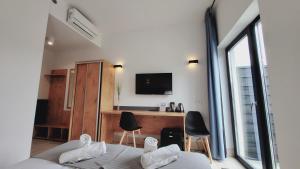 TV a/nebo společenská místnost v ubytování Hotel Konopielka
