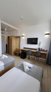 Postel nebo postele na pokoji v ubytování Hotel Konopielka