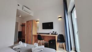 TV a/nebo společenská místnost v ubytování Hotel Konopielka