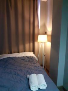 Hotel Driti New Bazaar房間的床