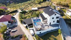 an aerial view of a house with a swimming pool at Moradia Activ Mar\Vão in Vila Real