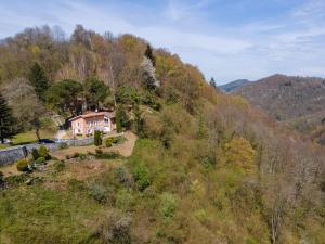 an aerial view of a house on a hill at La Réclot in Herran