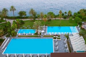 an aerial view of the pool at the resort at Akra Antalya in Antalya