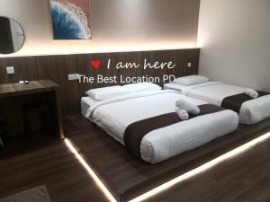 THE BEST LOCATION客房内的一张或多张床位