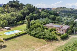 an aerial view of an estate with a swimming pool at Villa Boschetto in Montepulciano