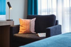 Posezení v ubytování Holiday Inn - the niu, Fusion Hamburg St. Georg by IHG