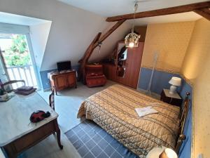 Postel nebo postele na pokoji v ubytování chez jocelyne la bonnaventure + 3 fotografie