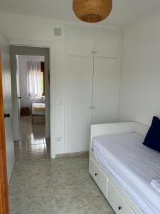 Postel nebo postele na pokoji v ubytování Casa de playa