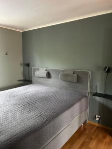 Säng eller sängar i ett rum på Tärnaby UpHill