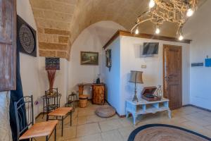 Posezení v ubytování Masseria li Vecchi