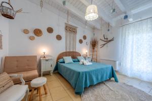 Postel nebo postele na pokoji v ubytování Masseria li Vecchi