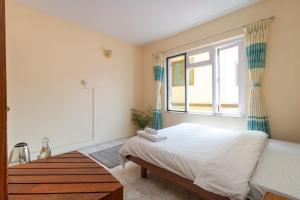 Postel nebo postele na pokoji v ubytování Hotel Sherwi Hyul