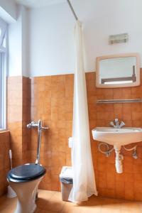 Koupelna v ubytování Hotel Sherwi Hyul