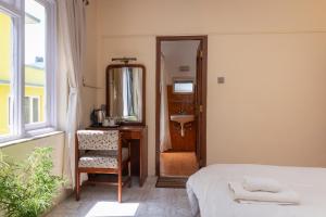 Postel nebo postele na pokoji v ubytování Hotel Sherwi Hyul + 28 fotografií