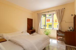 Postel nebo postele na pokoji v ubytování Hotel Sherwi Hyul